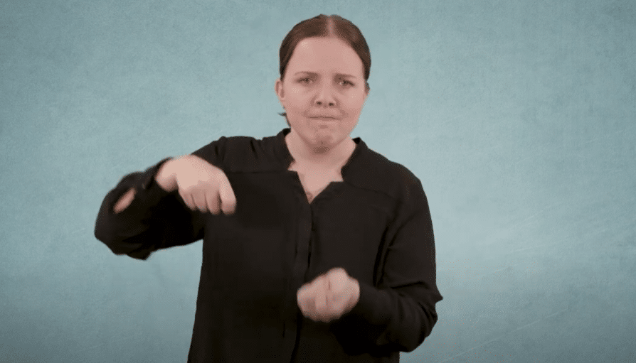 Dame som bruker tegnspråk