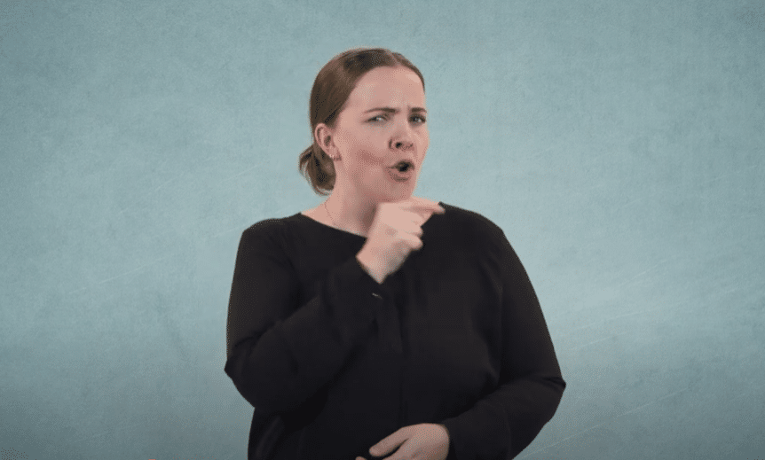 Dame som bruker tegnspråk