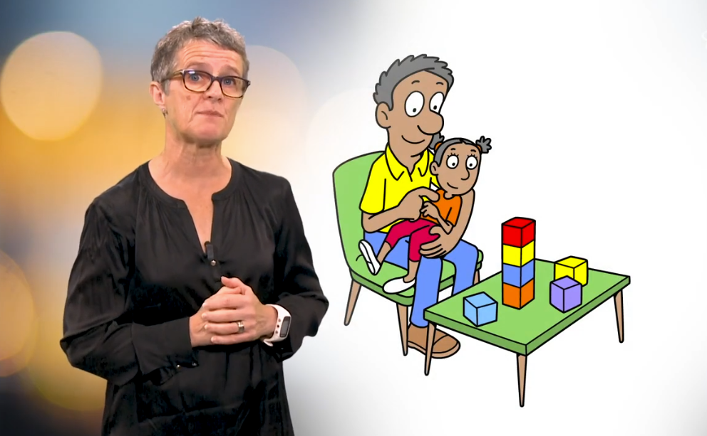 Voksen og barn har felles oppmerksomhet mot et tårn.